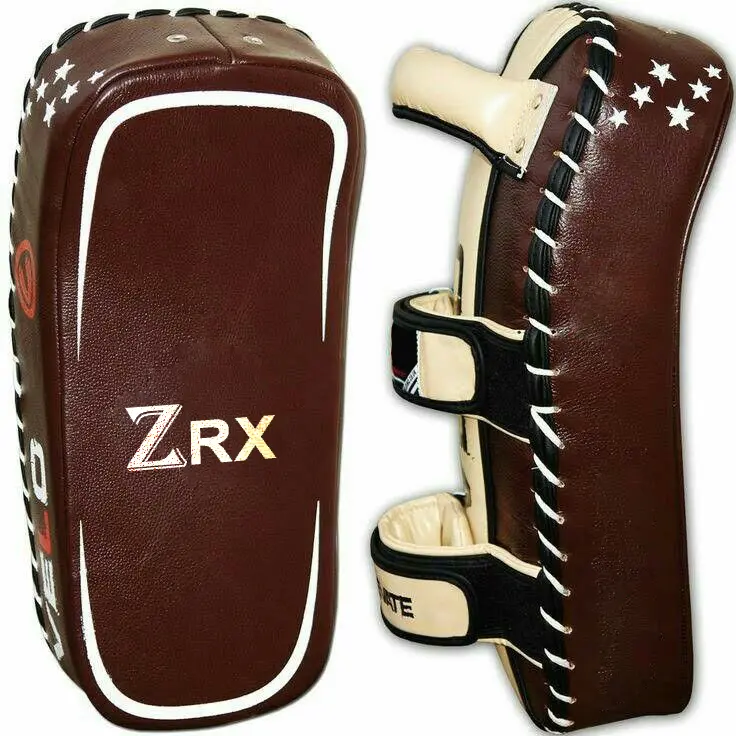 Thai Pads: Constructed with synthetic leather and featuring reinforced handles with dual velcro straps.